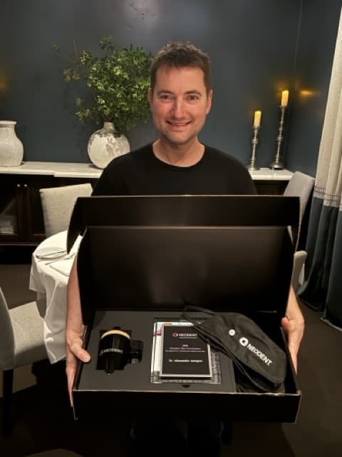 Dr. Alexander Antipov receiving the 2026 Neodent Elite Practitioner Award